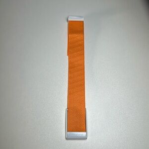 Whoop 4.0 Superknit Band Orange with white clasp. New. Never worn.